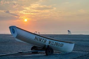 A white boat on the shore