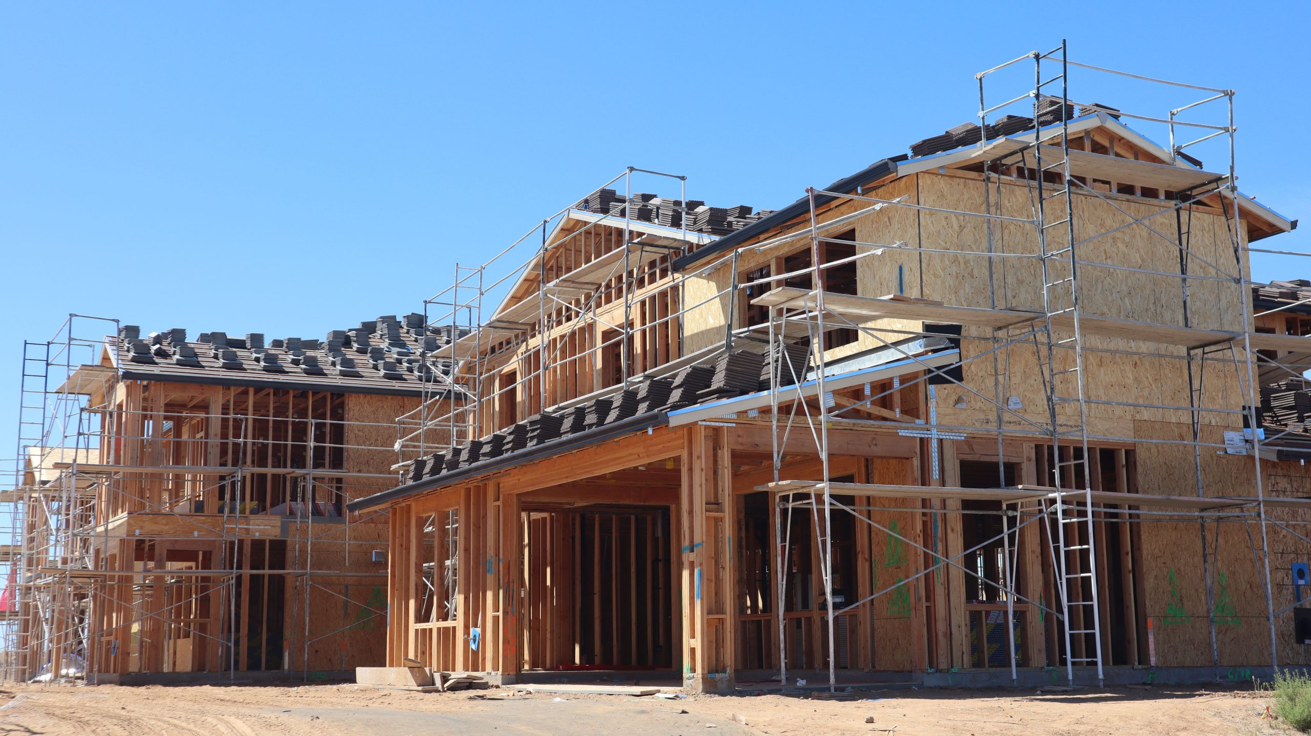 Modern home construction site with scaffolding