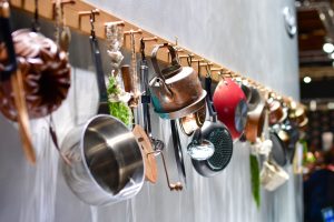 Rustic hanging kitchenware display in helsinki