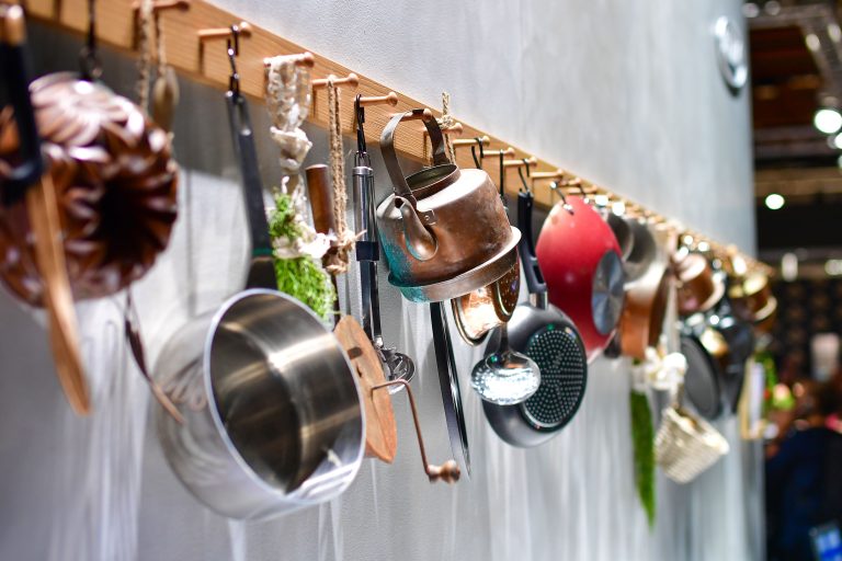 Rustic hanging kitchenware display in helsinki